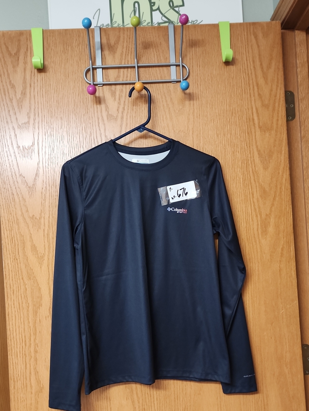 Columbia Navy Long-Sleeve Performance Tee M number 676 runs alittle smaller..